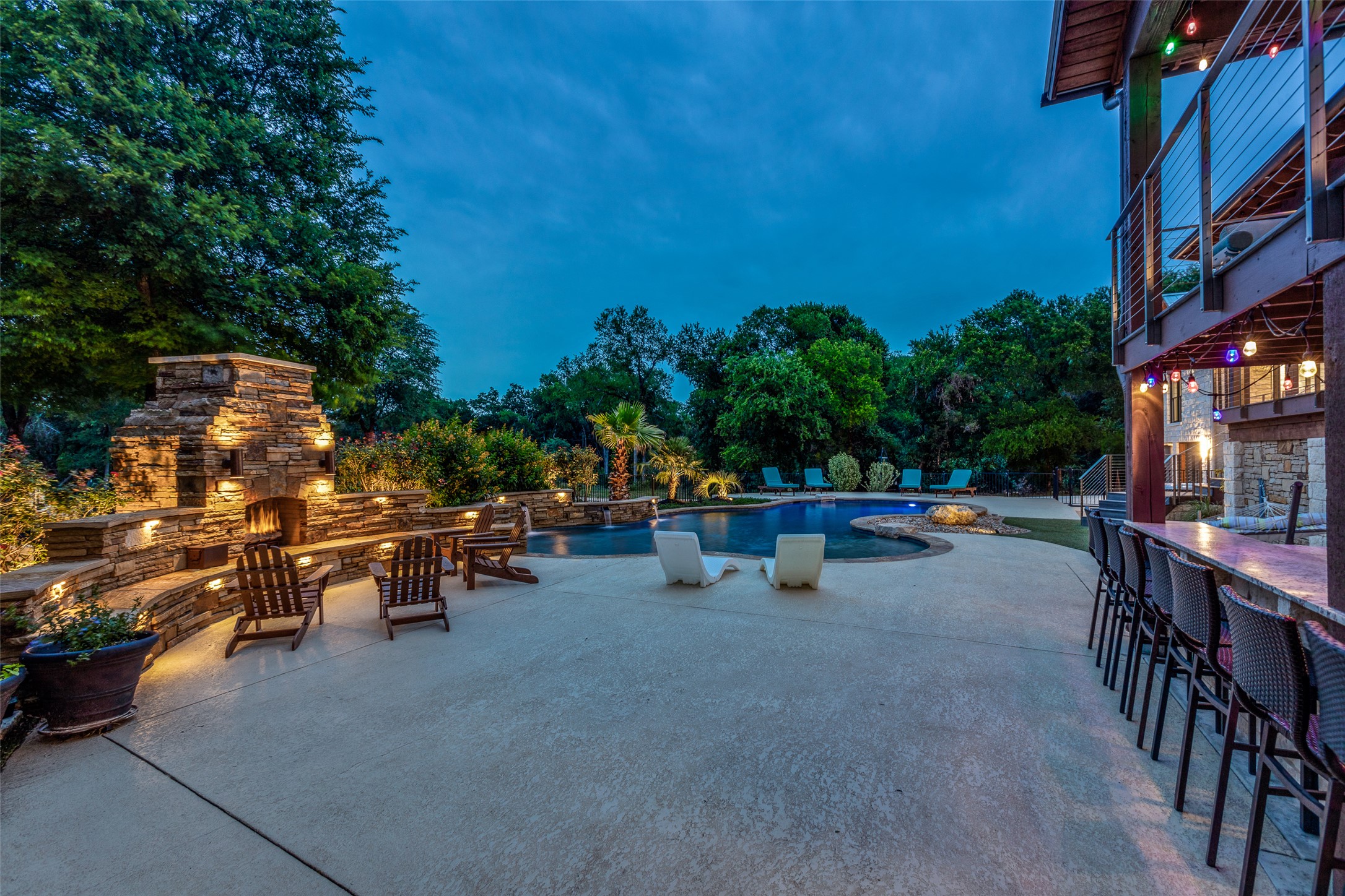 608 Innwood Drive Georgetown, TX 78628 - Photo 40 of 40 Relax by the outdoor fireplace after a swim