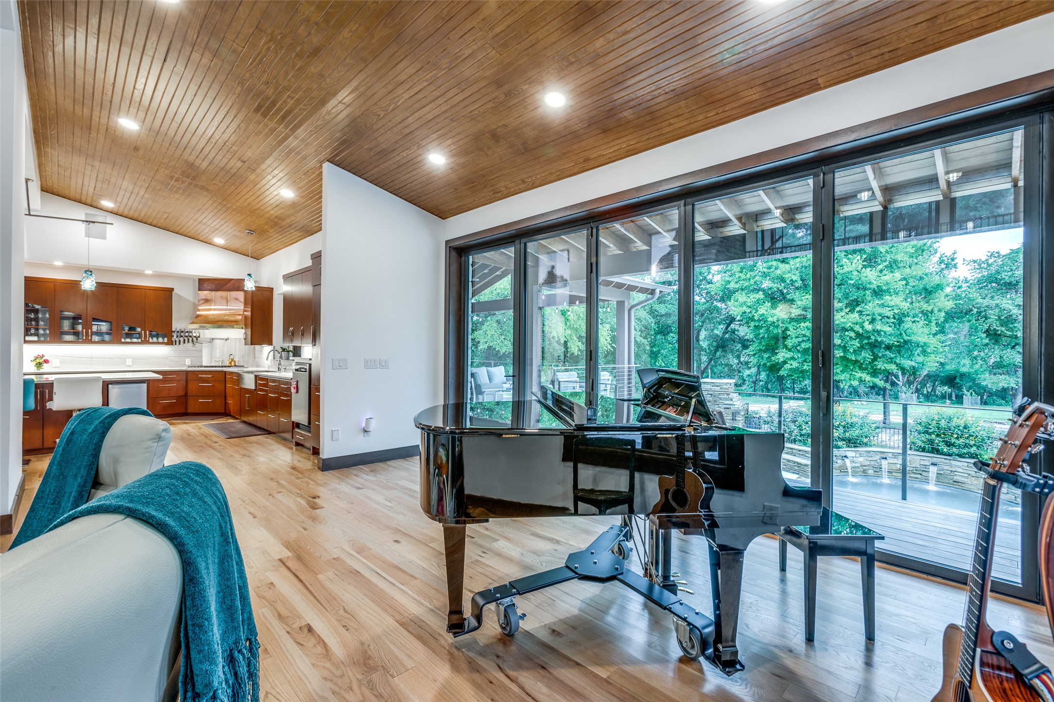 608 Innwood Drive Georgetown, TX 78628 - Photo 5 of 40 Living room movable wall of windows that open to create a seamless experience with the outdoors