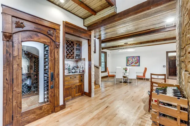 a view of living room with furniture and large window