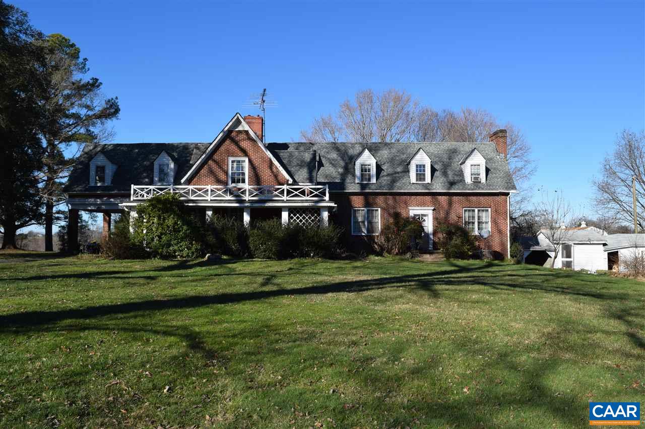5061 Poindexter Road Louisa, VA 23093 - Photo 1 of 44 a front view of a house with a yard