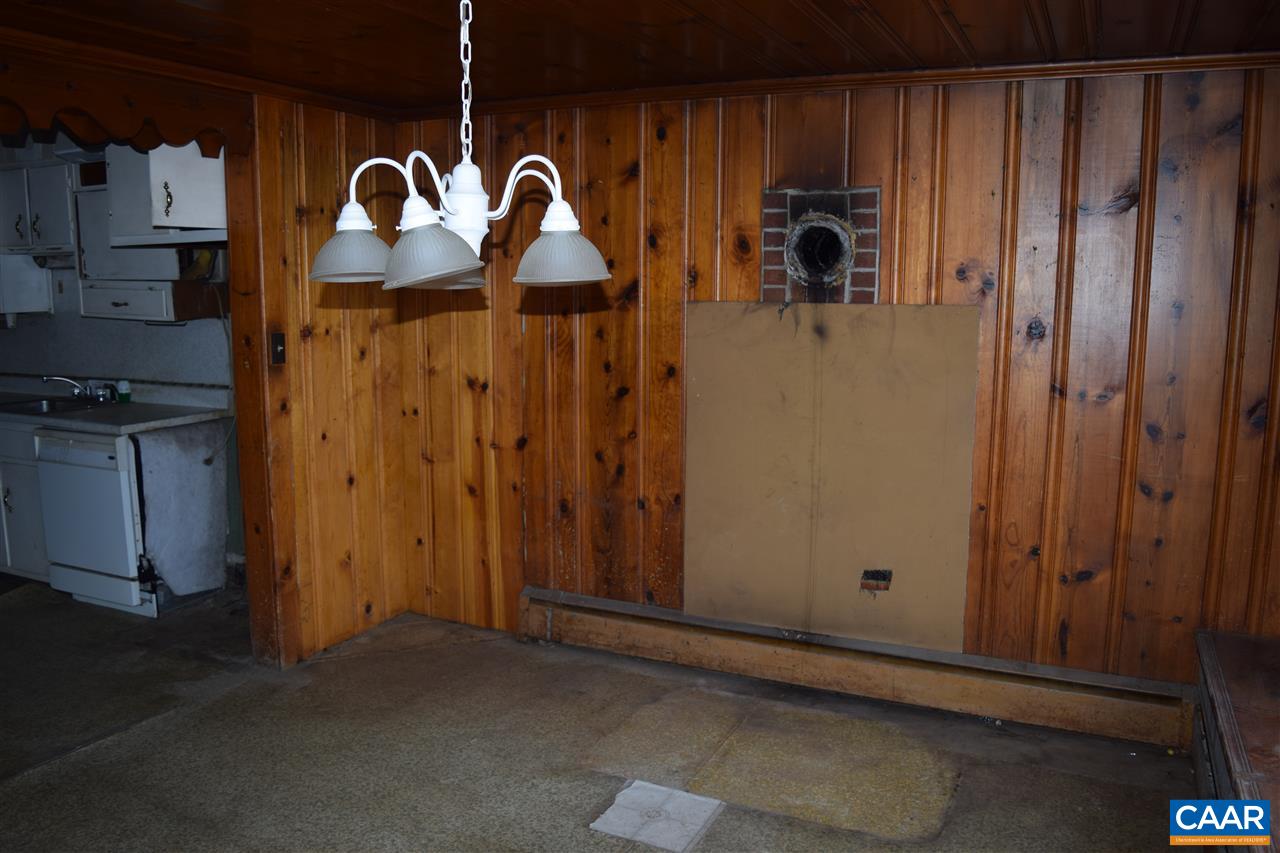 5061 Poindexter Road Louisa, VA 23093 - Photo 20 of 44 an entryway door with lots of wooden cabinets