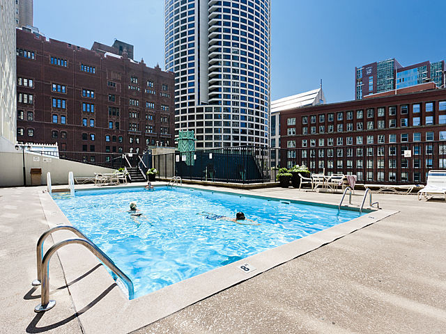 111 East Chestnut Street, Unit 16F Chicago, IL 60611 - Photo 19 of 20 a view of a swimming pool with a patio
