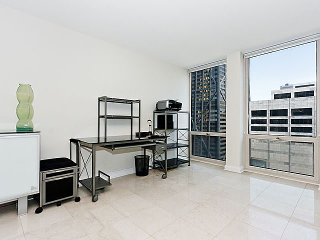 111 East Chestnut Street, Unit 16F Chicago, IL 60611 - Photo 9 of 20 a view of a workspace with furniture