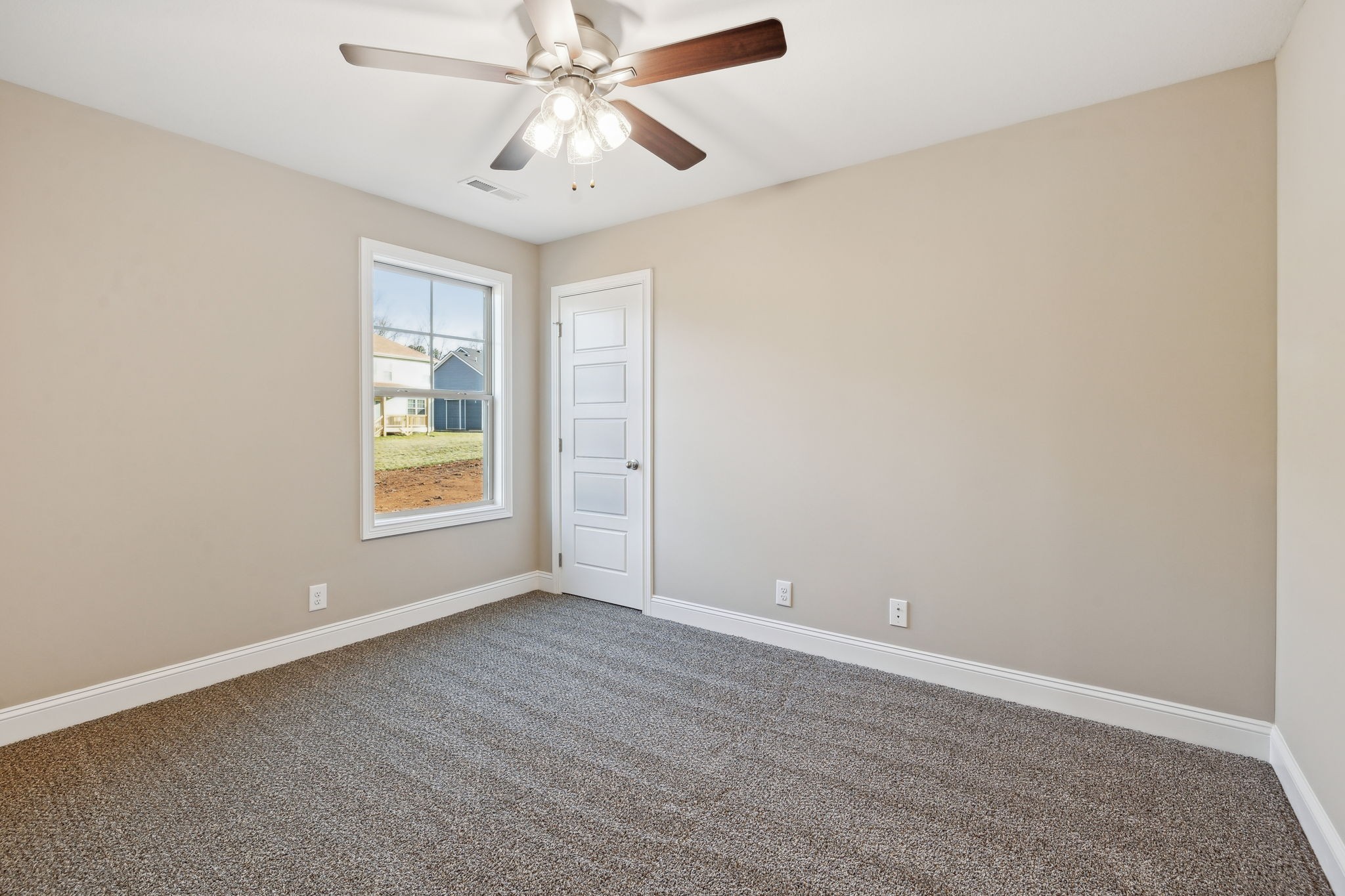 1271 Racker Drive Clarksville, TN 37043 - Photo 22 of 36 an empty room with windows and fan