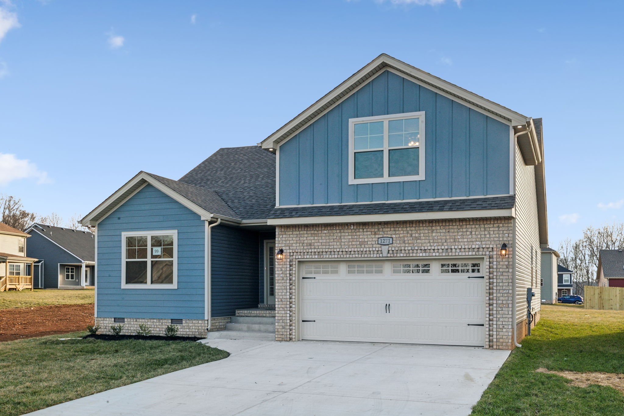 1271 Racker Drive Clarksville, TN 37043 - Photo 36 of 36 a front view of a house with a yard