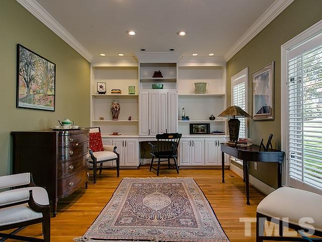 7905 Ogden Court Raleigh, NC 27613 - Photo 5 of 25 a living room with furniture and a rug