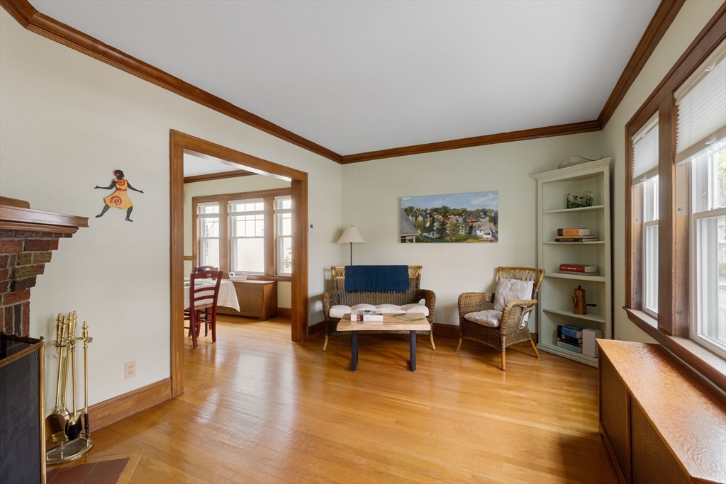 59 Chesbrough Road Boston, MA 02132 - Photo 5 of 27 a living room with furniture and a large window