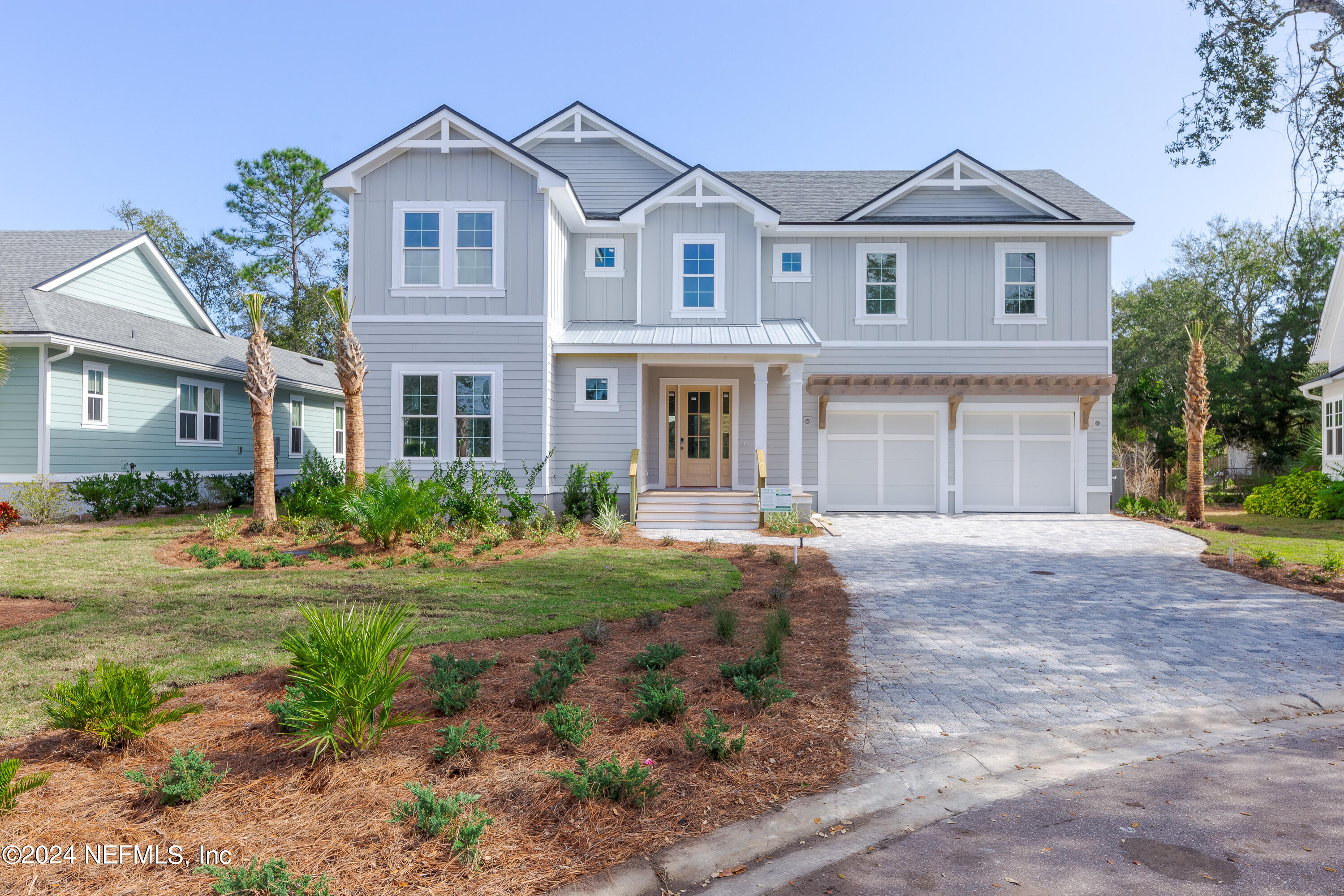 372 Ridgeway Road St. Augustine, FL 32080 - Photo 1 of 38 a front view of a house with garden