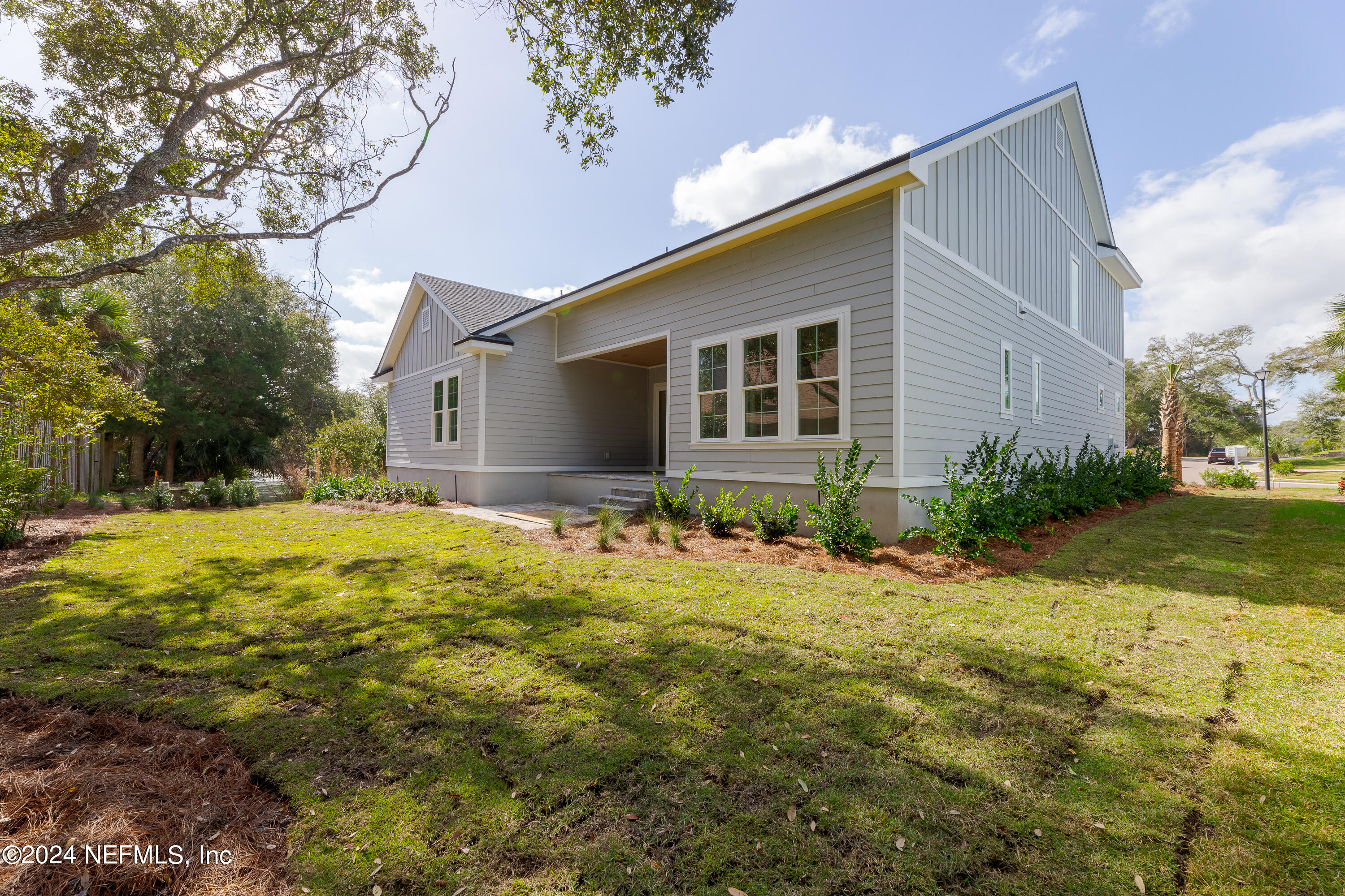 372 Ridgeway Road St. Augustine, FL 32080 - Photo 11 of 38 a front view of house with yard and trees around