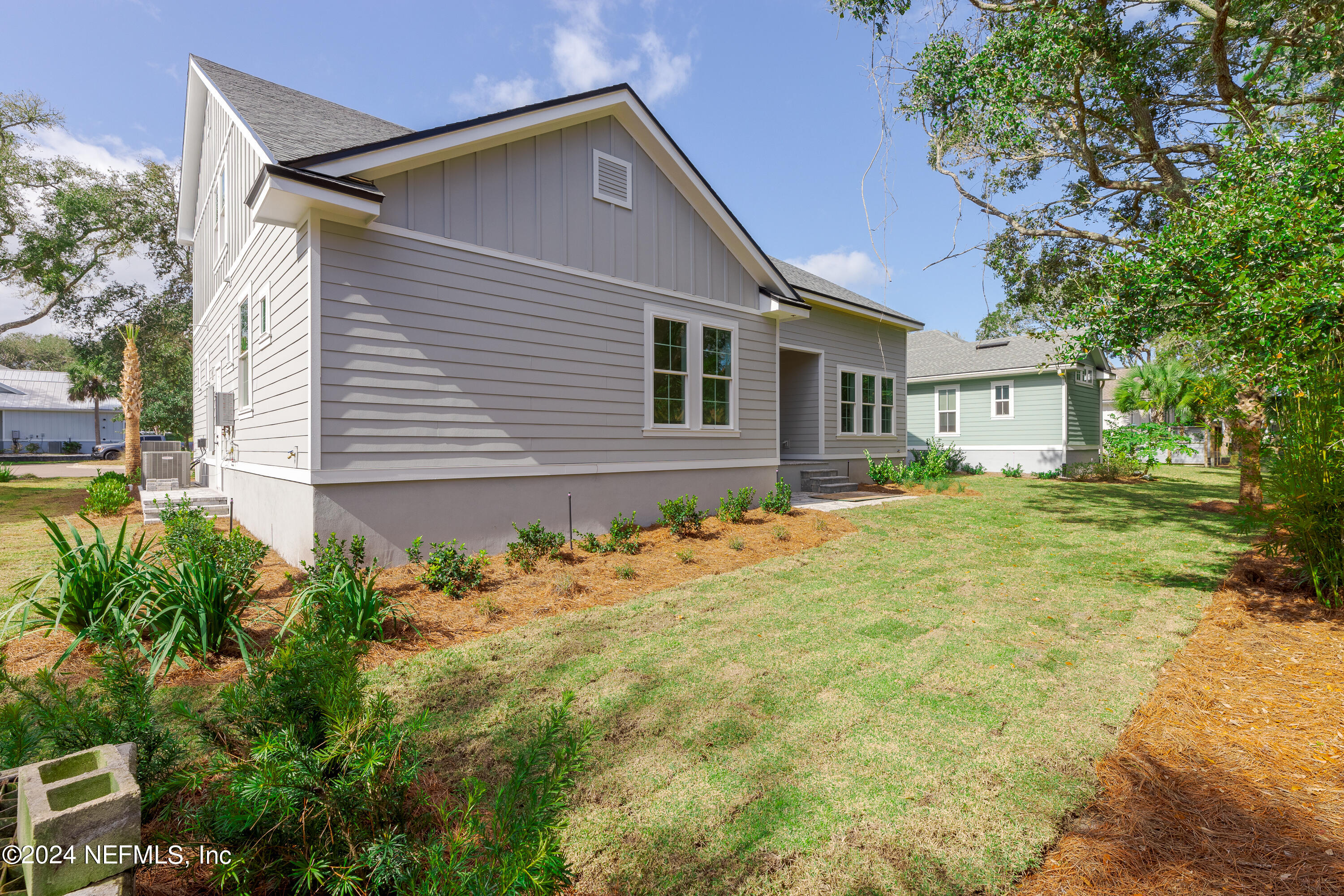 372 Ridgeway Road St. Augustine, FL 32080 - Photo 12 of 38 a front view of a house with a yard