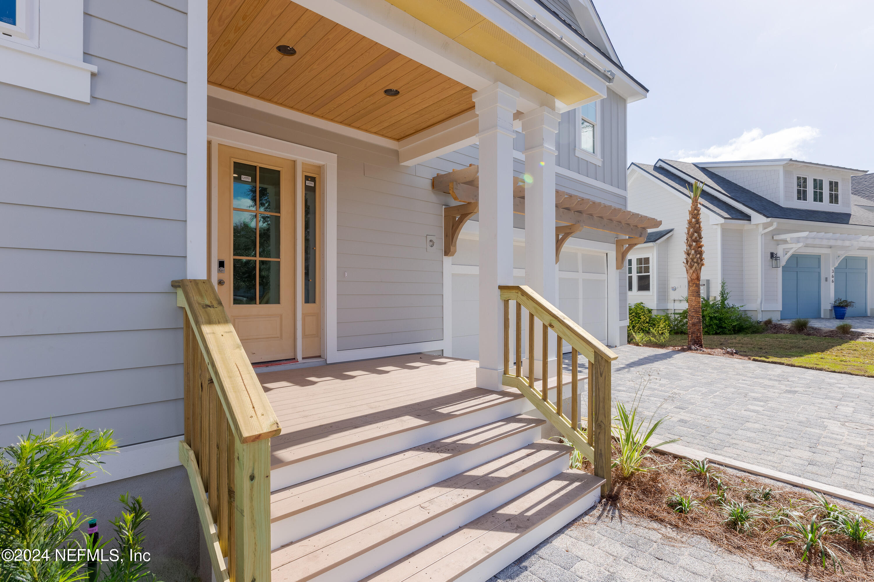 372 Ridgeway Road St. Augustine, FL 32080 - Photo 15 of 38 a view of a house with backyard and porch