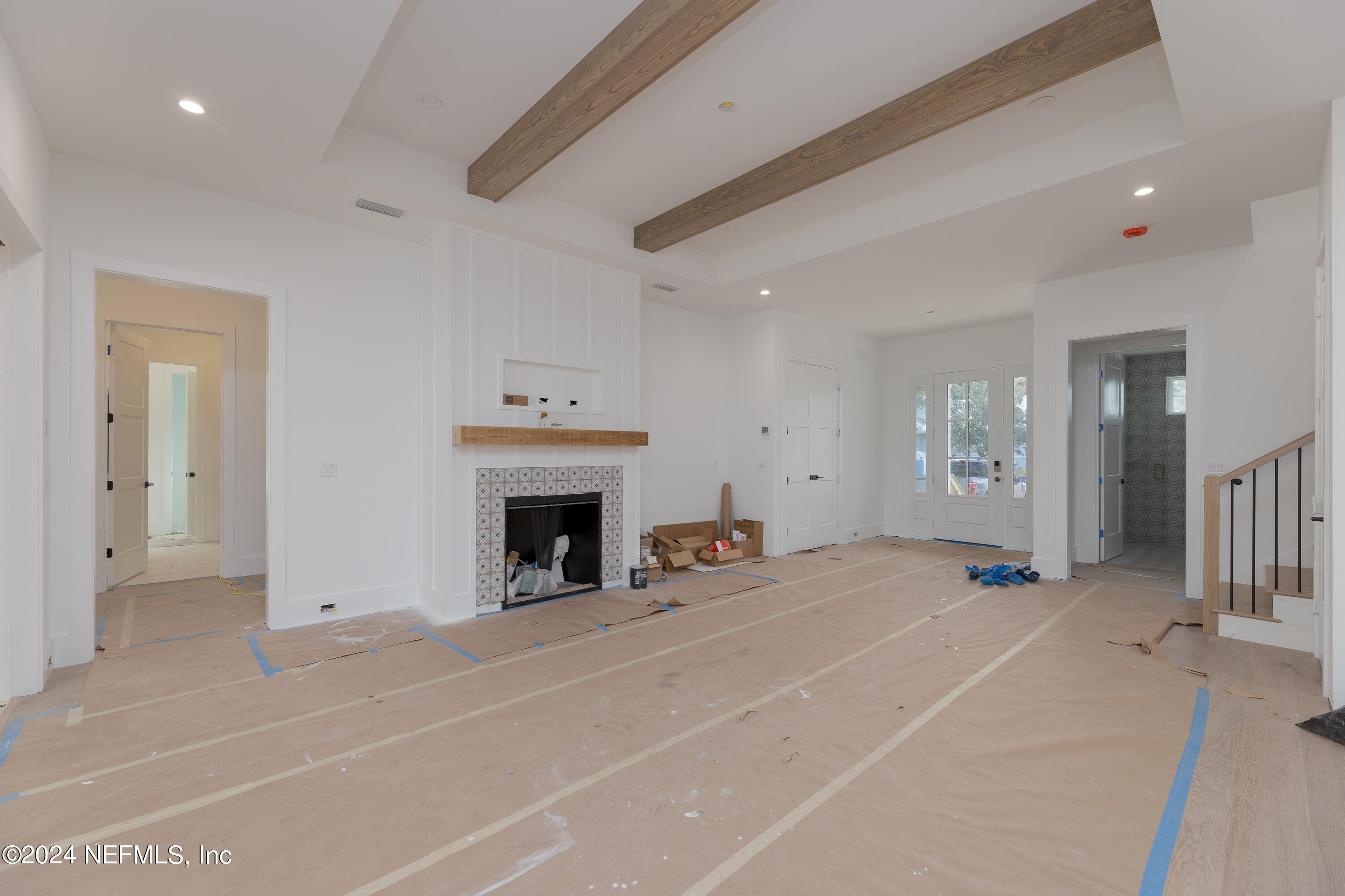 372 Ridgeway Road St. Augustine, FL 32080 - Photo 18 of 38 a view of a livingroom with a fireplace