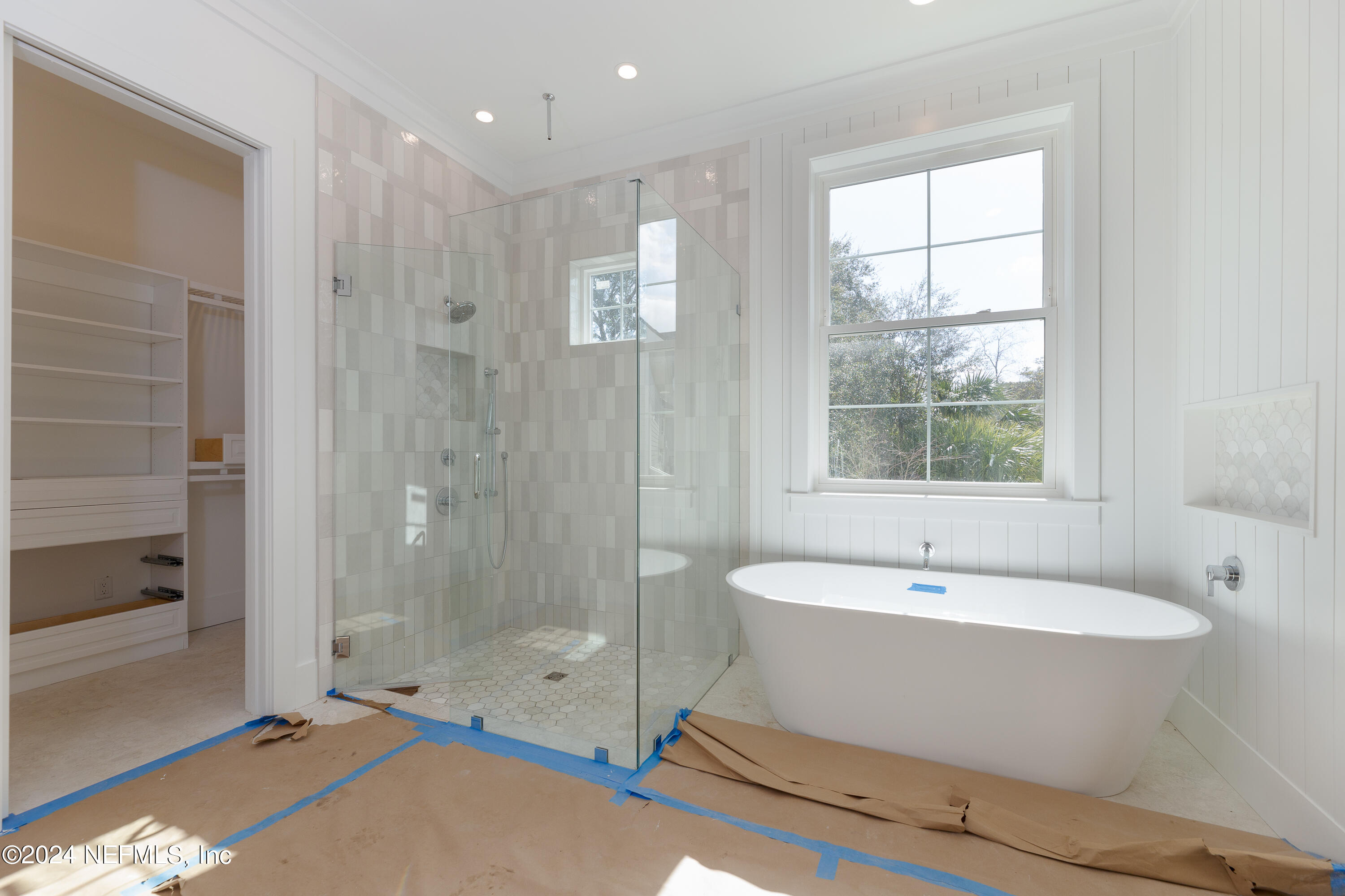 372 Ridgeway Road St. Augustine, FL 32080 - Photo 28 of 38 a bathroom with a bathtub and shower