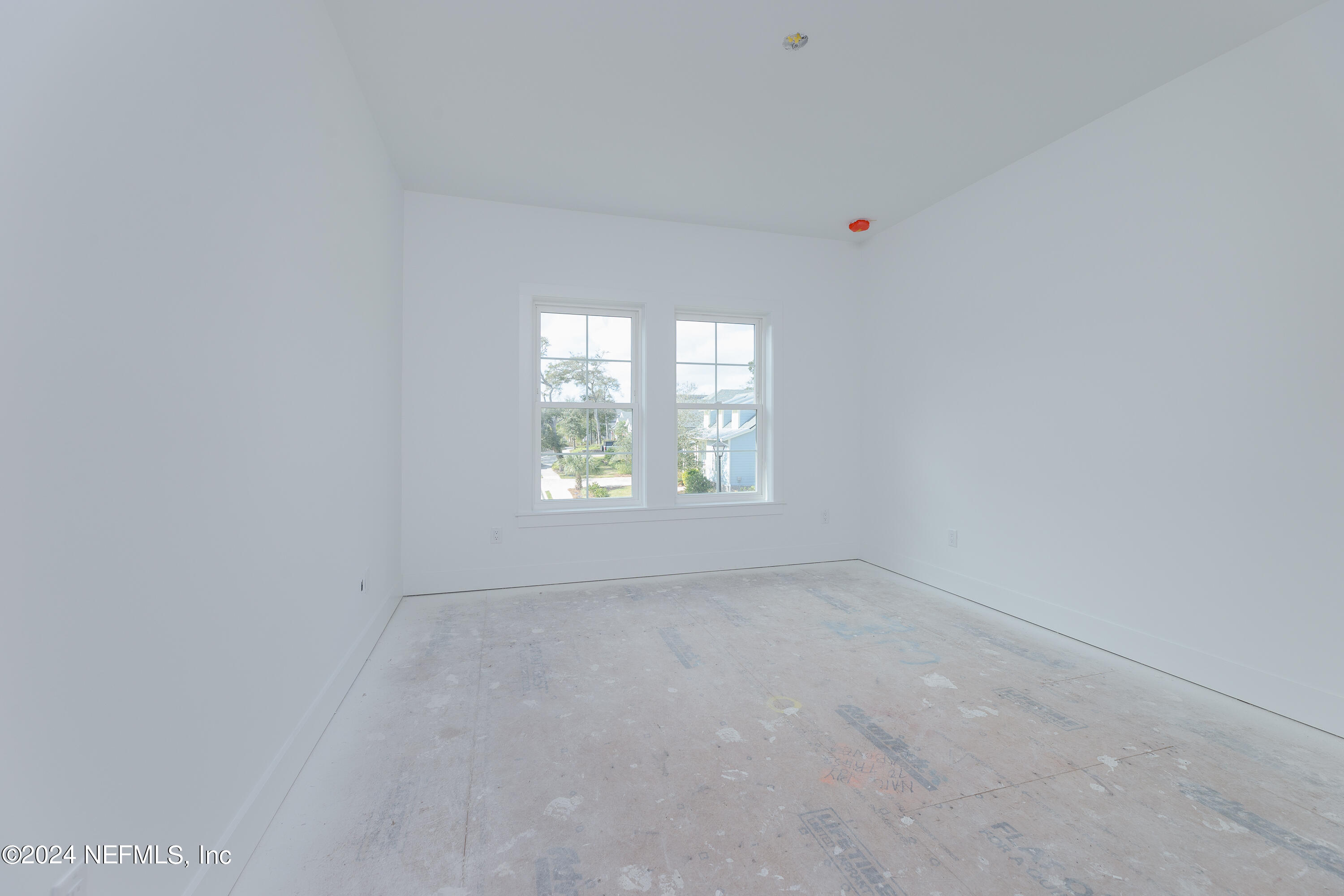 372 Ridgeway Road St. Augustine, FL 32080 - Photo 33 of 38 an empty room with windows
