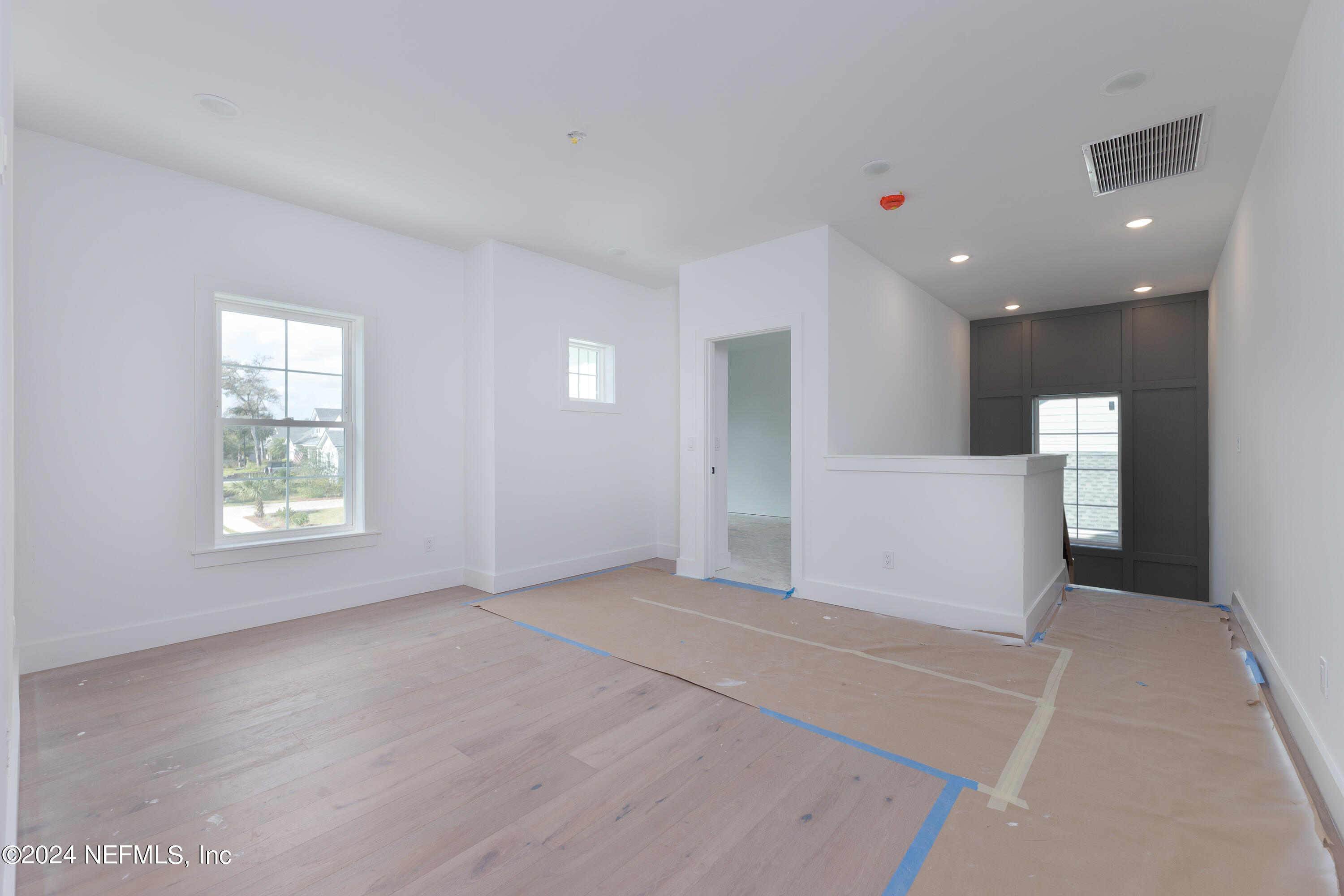 372 Ridgeway Road St. Augustine, FL 32080 - Photo 35 of 38 a view of empty room with windows