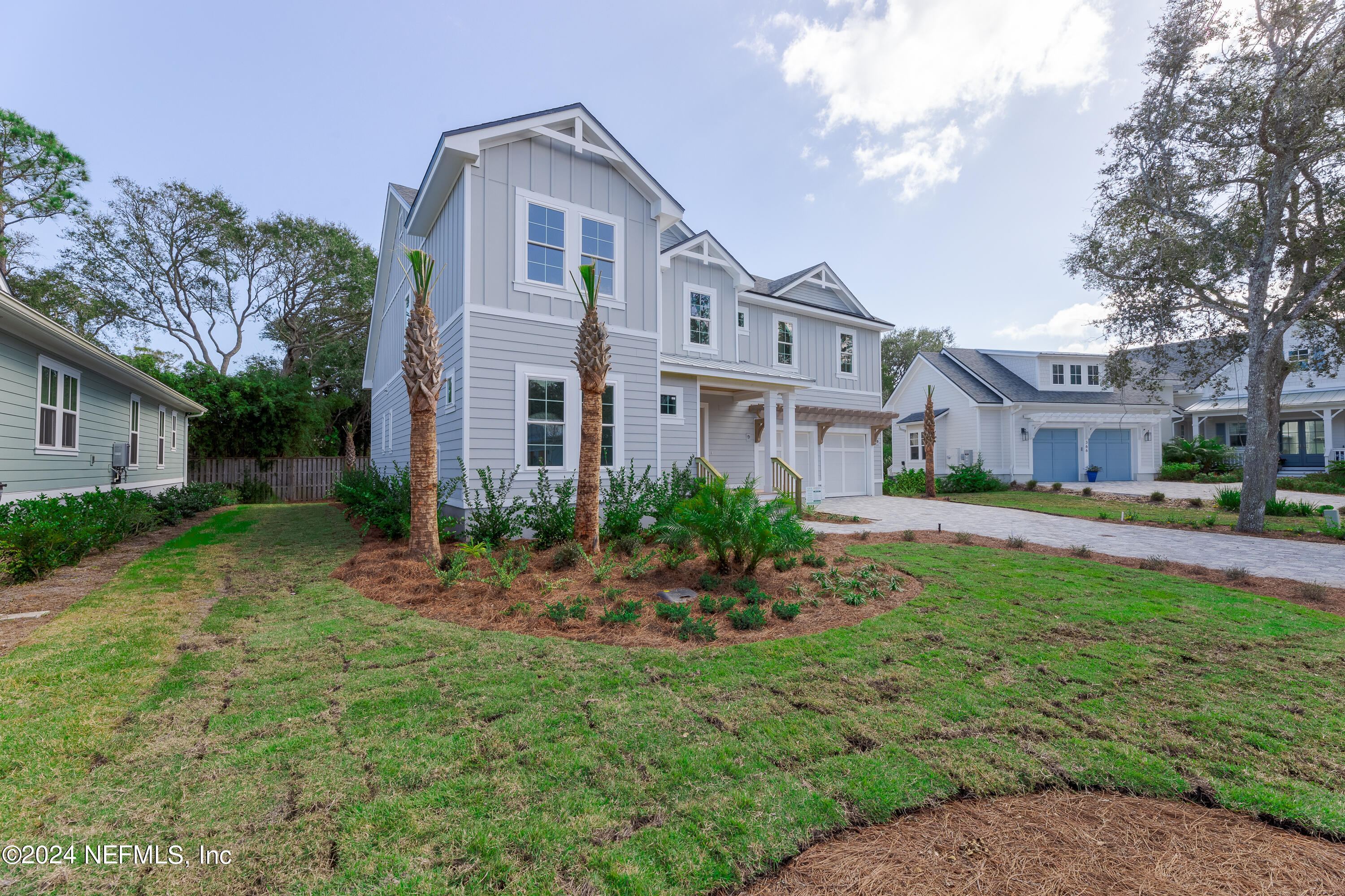 372 Ridgeway Road St. Augustine, FL 32080 - Photo 7 of 38 a front view of a house with a yard