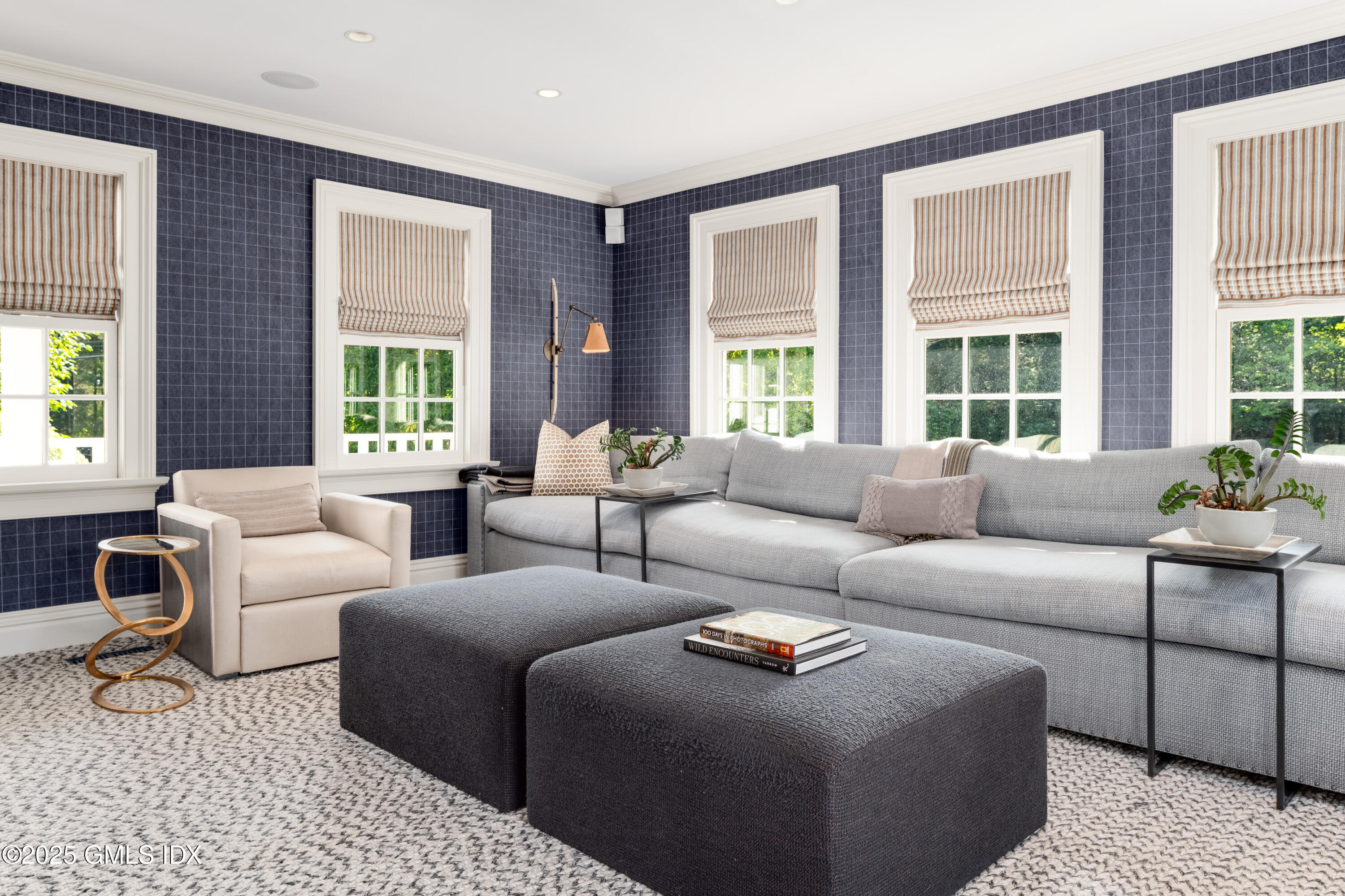 411 Stanwich Road Greenwich, CT 06830 - Photo 12 of 36 a living room with furniture and a large window