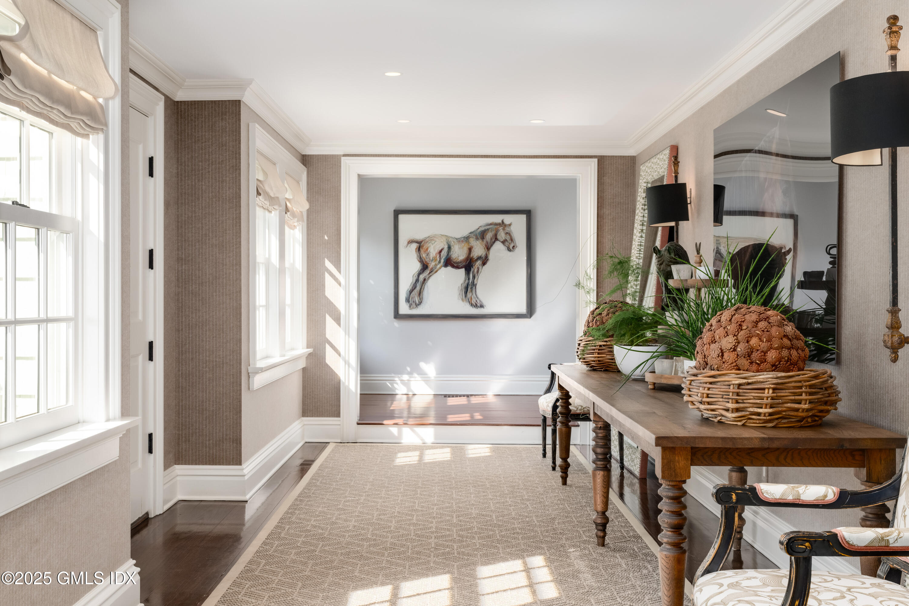 411 Stanwich Road Greenwich, CT 06830 - Photo 8 of 36 a living room with furniture and a window