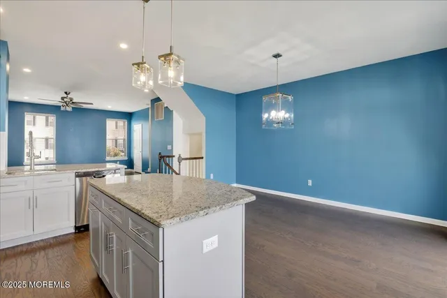 a view of a balcony with wooden floor