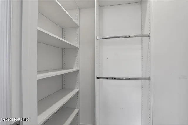 a close view of a utility room with washer and dryer