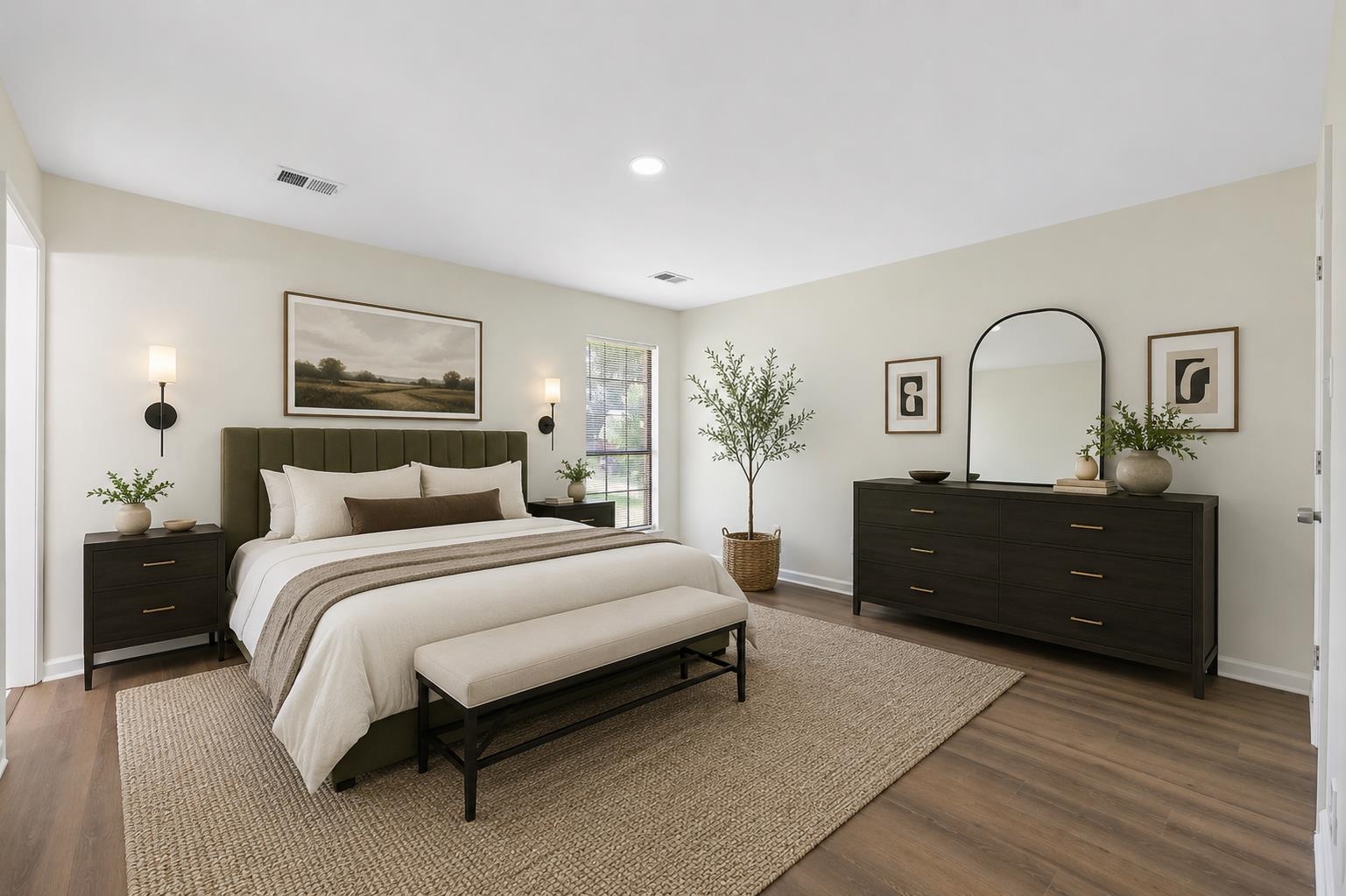 6400 Saginaw Road Memphis, TN 38134 - Photo 10 of 27 Generously sized primary bedroom featuring updated flooring, neutral colors, abundant natural light, and plenty of space for large furnishings and a relaxing retreat. This photo has been virtually staged.