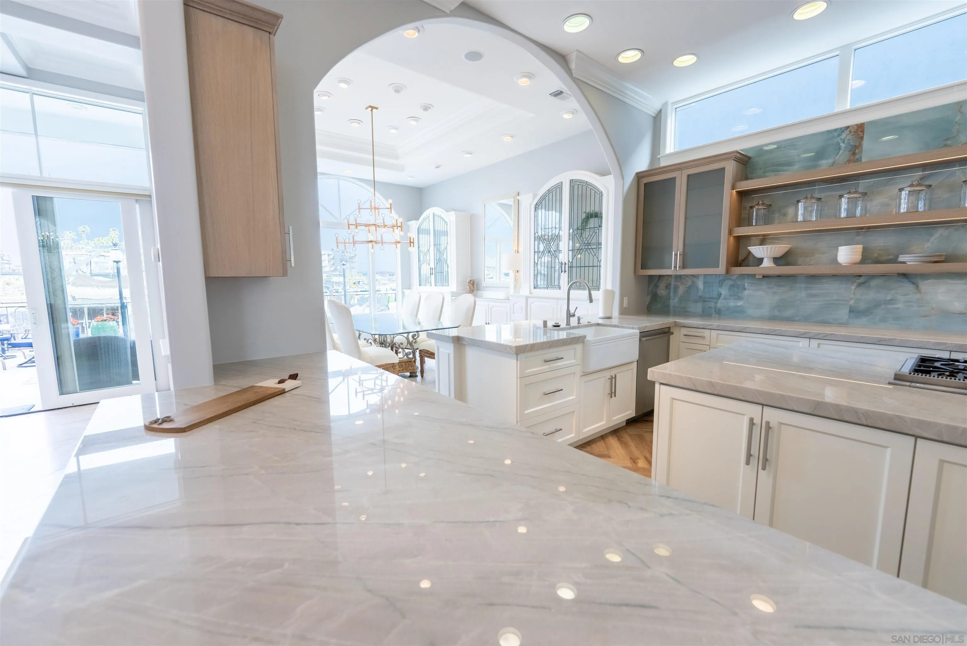 29 The Point Coronado, CA 92118 - Photo 11 of 52 a large white kitchen with a large window