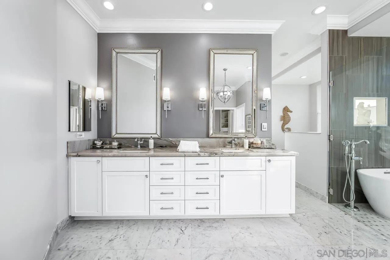 29 The Point Coronado, CA 92118 - Photo 25 of 52 a bathroom with a double vanity sink mirror and toilet