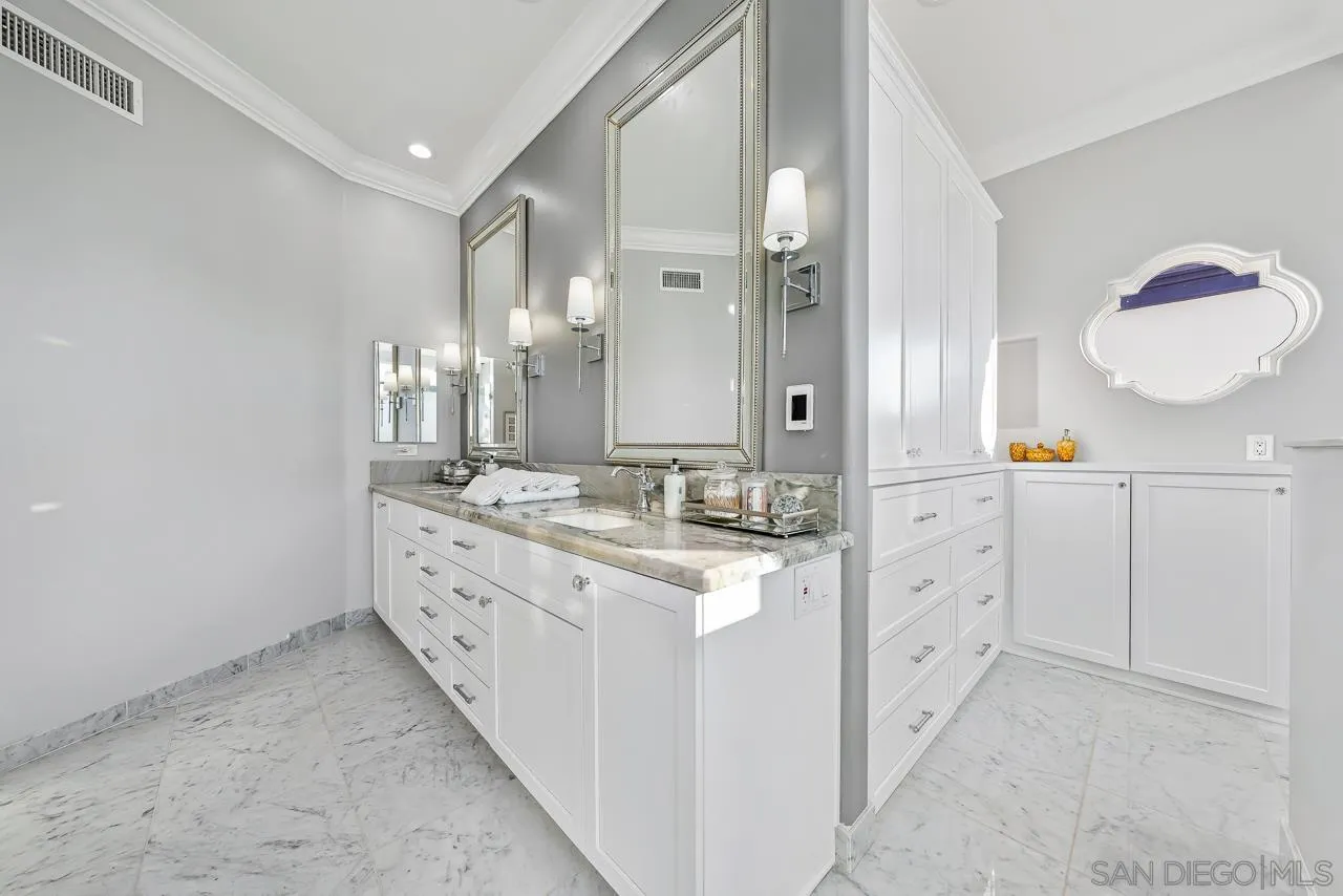 29 The Point Coronado, CA 92118 - Photo 27 of 52 a bathroom with a double vanity sink mirror and double