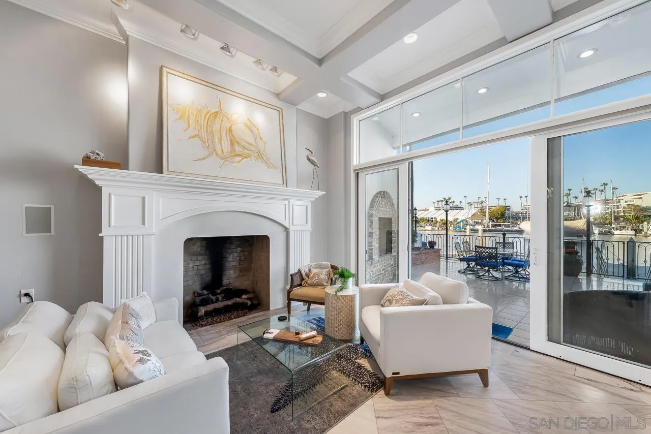 29 The Point Coronado, CA 92118 - Photo 3 of 52 a living room with furniture and a fireplace