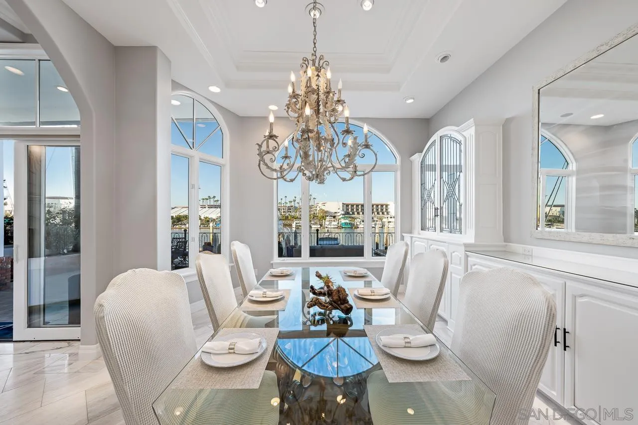 29 The Point Coronado, CA 92118 - Photo 4 of 52 a living room with furniture and a chandelier