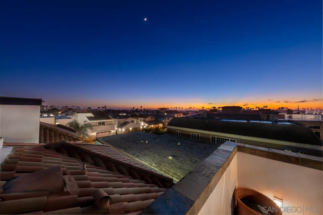 29 The Point Coronado, CA 92118 - Photo 46 of 52 a view of a balcony with wooden floor and city view
