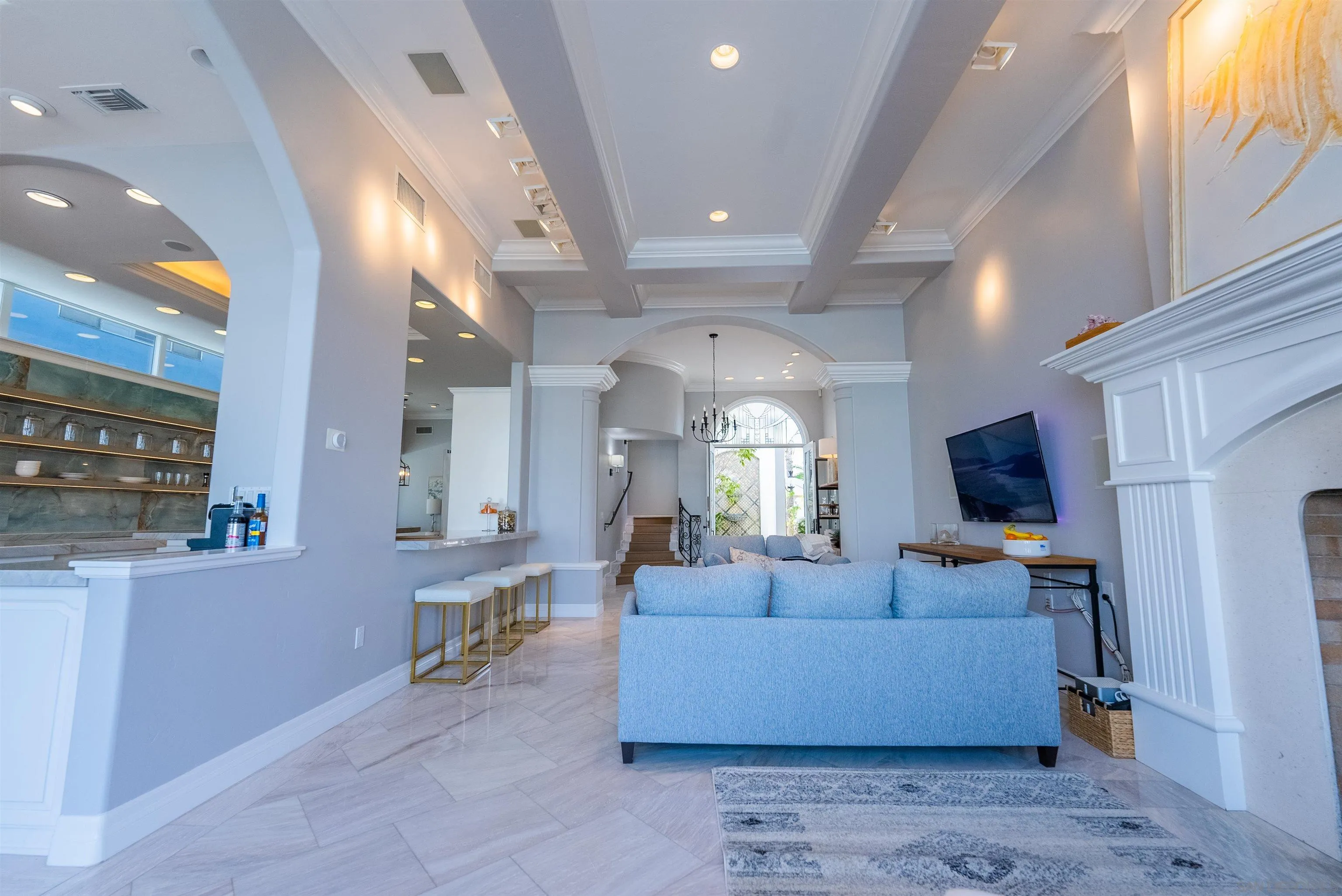 29 The Point Coronado, CA 92118 - Photo 5 of 52 a living room with furniture and a flat screen tv