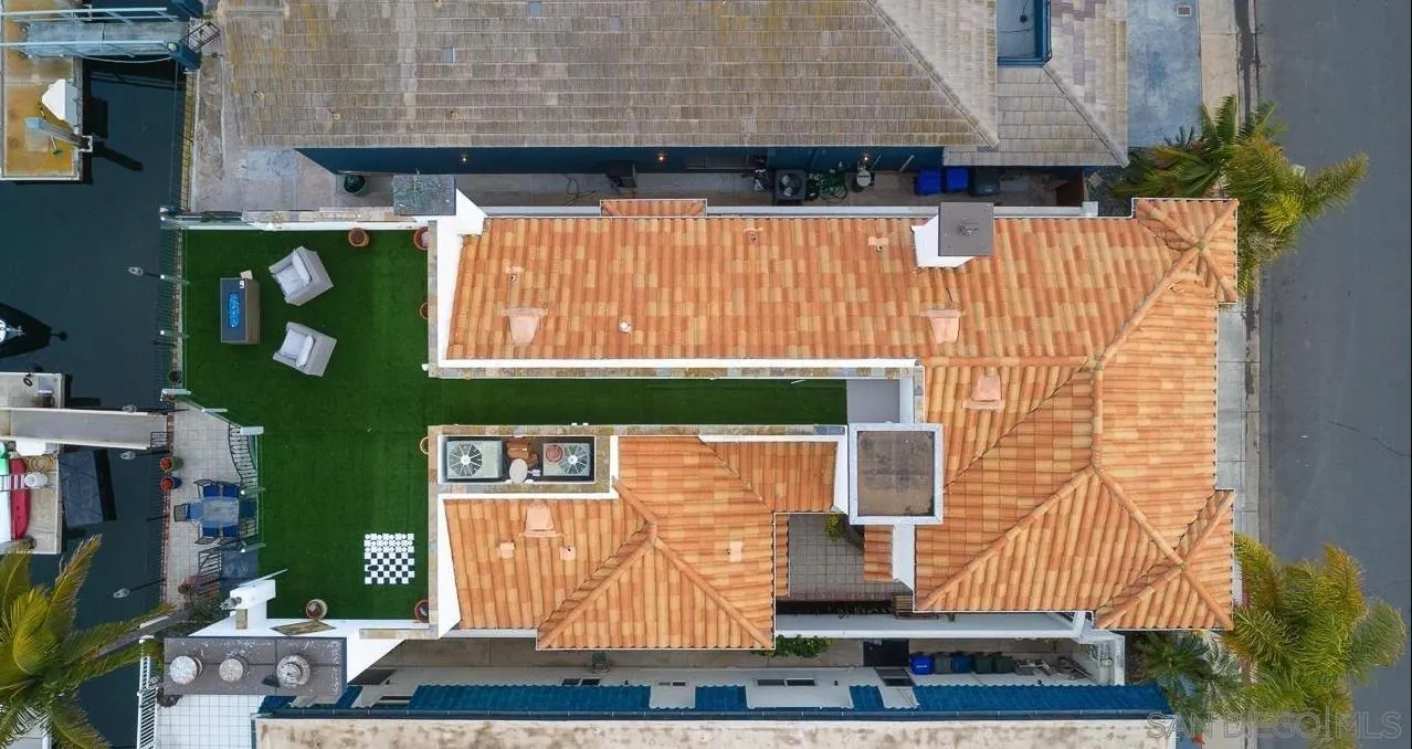 29 The Point Coronado, CA 92118 - Photo 51 of 52 a front view of a house with a garden