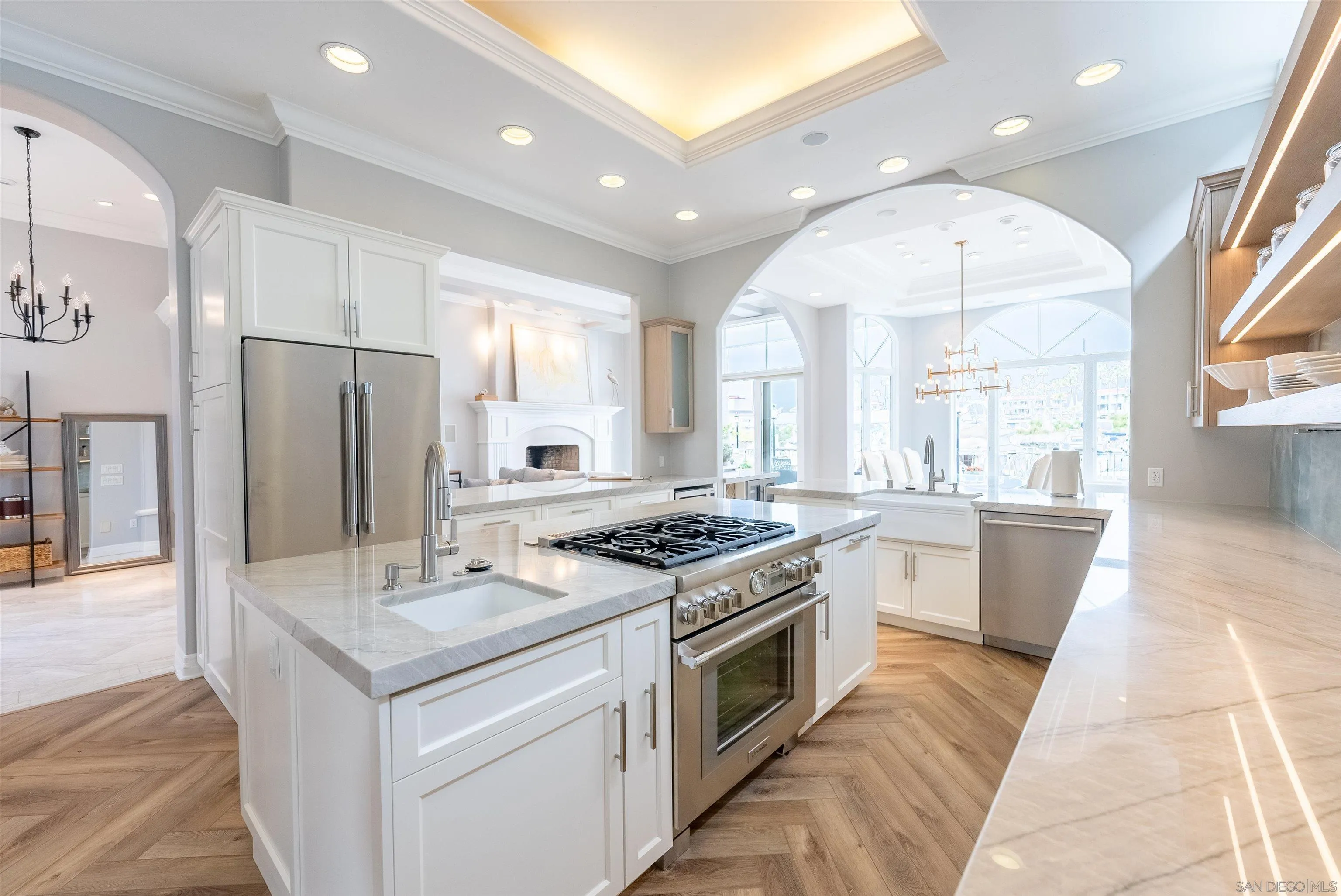 29 The Point Coronado, CA 92118 - Photo 9 of 52 a kitchen with a sink stove and refrigerator