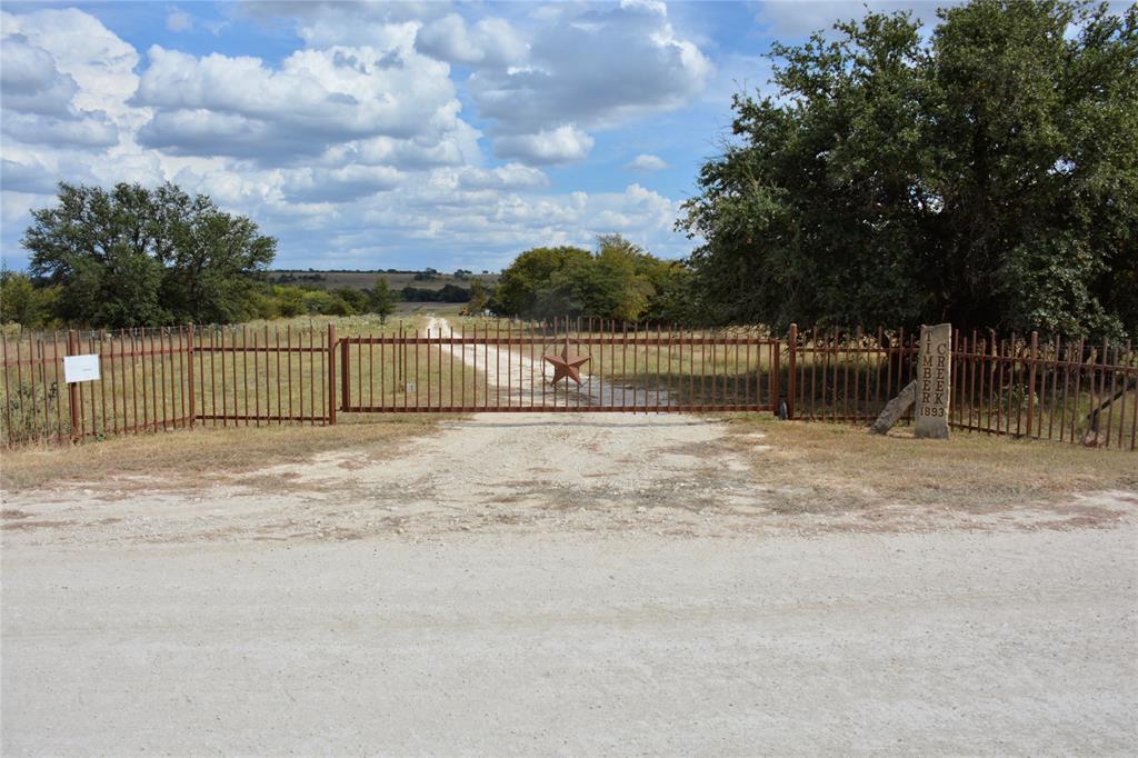 a view of outdoor space with iron fence