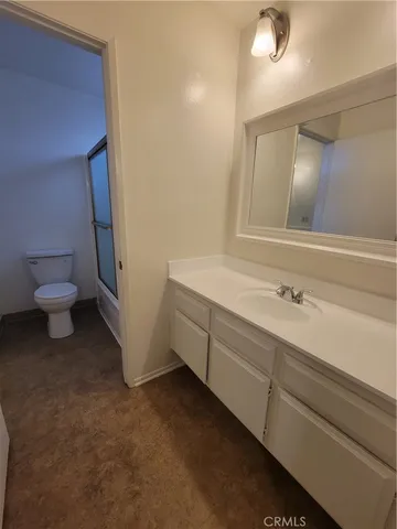 a bathroom with a sink and a toilet