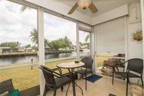 298 Southeast 6th Avenue, Unit 9 Pompano Beach, FL 33060 - Photo 11 of 22 a outdoor space with furniture