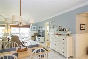 a view of a livingroom with furniture window and outside view