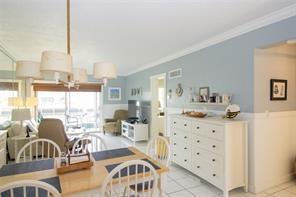 298 Southeast 6th Avenue, Unit 9 Pompano Beach, FL 33060 - Photo 9 of 22 a view of a livingroom with furniture window and outside view