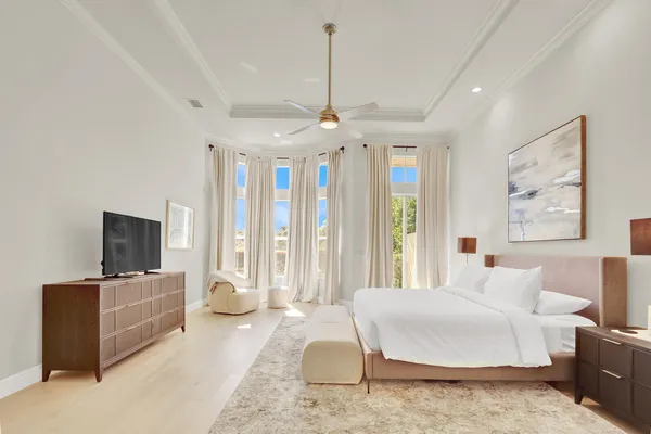 a bathroom with a sink a toilet and shower curtain