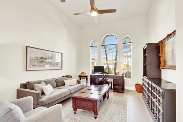 an aerial view of multiple houses with yard