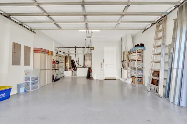 an aerial view of a city with lounge chairs
