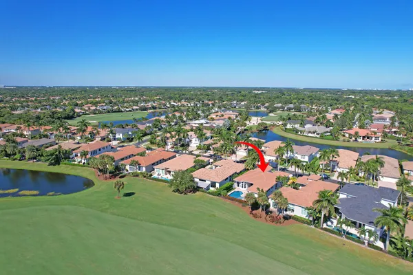 an aerial view of a city with lots of residential buildings ocean and ocean view