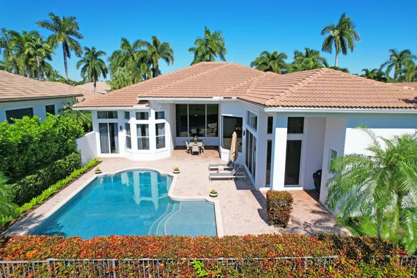 an aerial view of a city and lake view