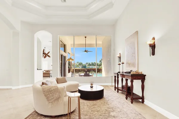 a living room with furniture and a table