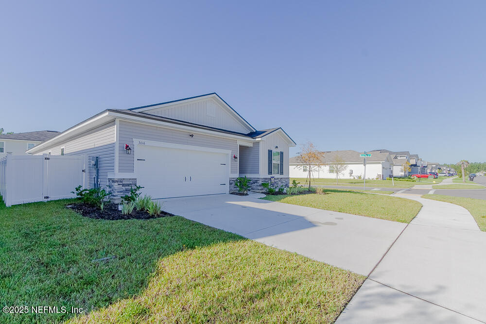 3616 Cunningham Road Orange Park, FL 32065 - Photo 3 of 48 a view of house with outdoor space and swimming pool