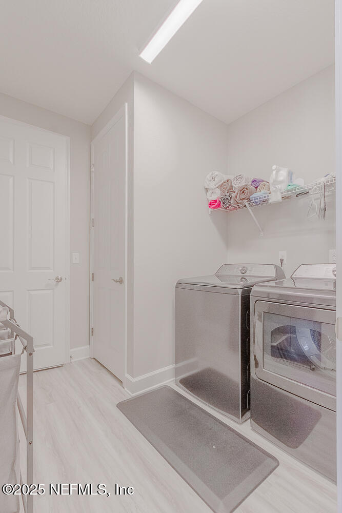 3616 Cunningham Road Orange Park, FL 32065 - Photo 31 of 48 a utility room with faucet washer and dryer