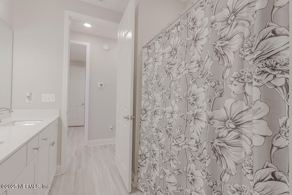 3616 Cunningham Road Orange Park, FL 32065 - Photo 33 of 48 a bathroom with a shower and a sink