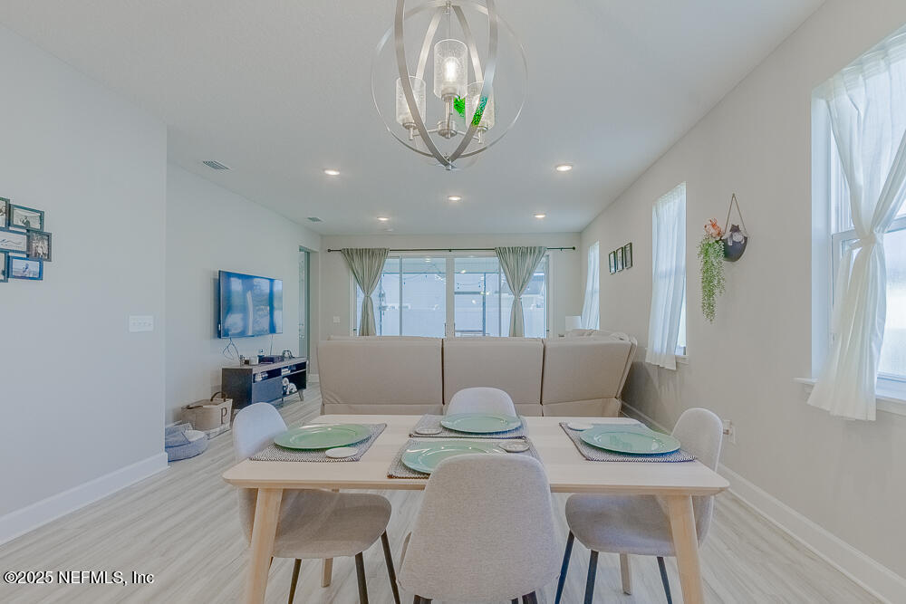 3616 Cunningham Road Orange Park, FL 32065 - Photo 9 of 48 a view of a dining room with furniture
