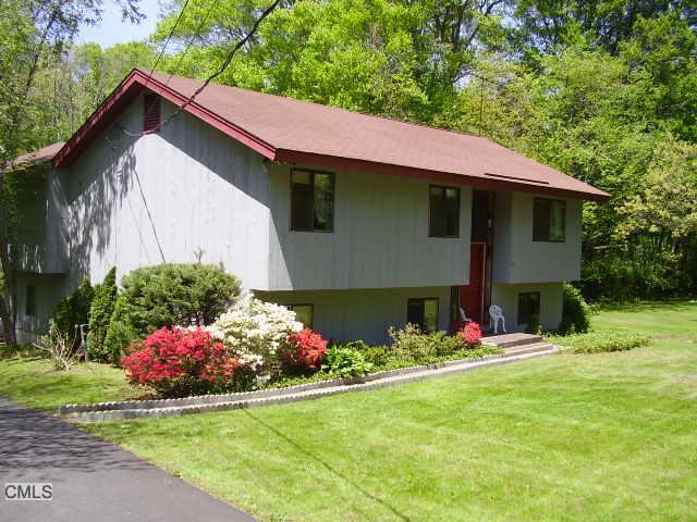 a front view of house with yard